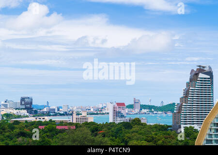 Cityscape and landscape on blue sky background, Pattaya, Chonburi, Thailand. Pattaya city is famous about sea sport and night life entertainment in Th Stock Photo