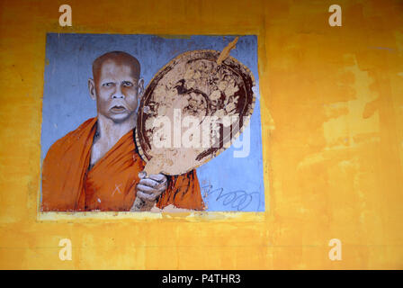Faces painted on wall of school, Lankathilaka Maha Vidyalaya, Kovilakanda, Sri Lank Stock Photo