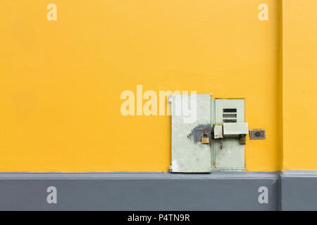 Set of lines on the wall with padlocked door Stock Photo