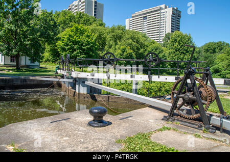 The Rideau Canal opened in 1832 connects Ottawa to the Great Lakes and St. Lawrence River running 202 kilometers. There are many locks all manual. Stock Photo