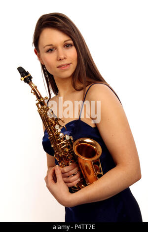 young woman playing a soprano sax Stock Photo - Alamy