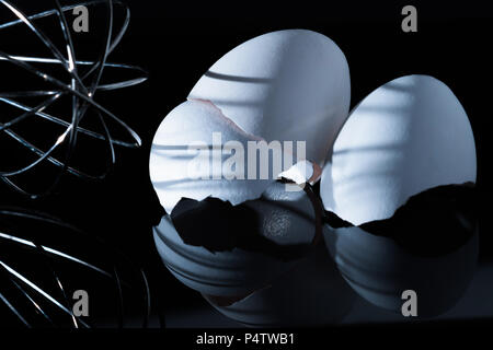 Egg shells on a black background Stock Photo