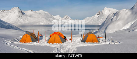 Greenland, Schweizerland Alps, Kulusuk, tents and skis Stock Photo