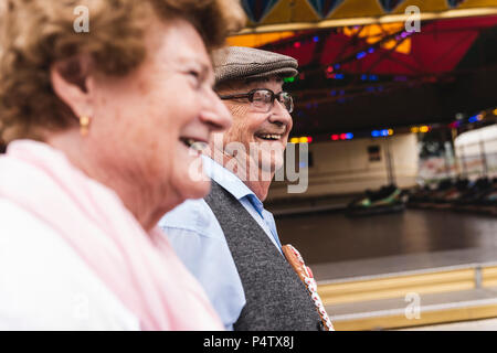 Happy senior couple on fair Stock Photo