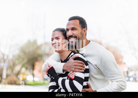 Happy couple having fun outdoors Stock Photo