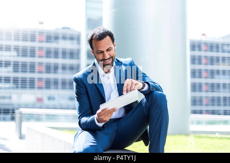 Business man using tablet Stock Photo