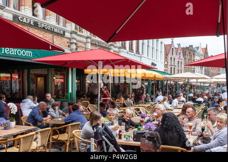 Bruegge, Belgium, tourists in street cafes at the Grote Markt in Bruegge Stock Photo