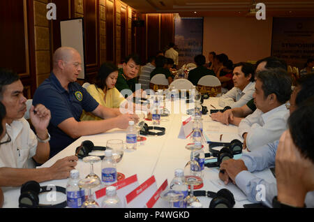 DA NANG, Vietnam (May 10, 2017) United States Coast Guard Chief Warrant Officer Jeremiah Winston participates in a table top exercise with Da Nang military, police and firefighters during a symposium on capacity building for oil spill response as part of Pacific Partnership 2017 Da Nang, May 10. Pacific Partnership is the largest annual multilateral humanitarian assistance and disaster relief preparedness mission conducted in the Indo-Asia-Pacific and aims to enhance regional coordination in areas such as medical readiness and preparedness for manmade and natural disasters. Stock Photo