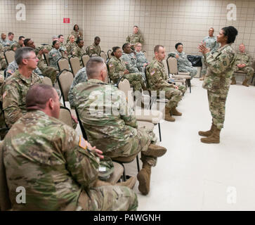 ROBINSON MANEUVER TRAINING CENTER, N. Little Rock, Ark.:—Chief Warrant Officer 3 Cassandra Green speaks during the Arkansas National Guard Equal Opportunity Office Diversity Day at Chappell Armory, Wednesday, May 10, 2017. The event was an opportunity to celebrate the diversity of the Total Force and embrace who we are and who we aren't regardless of race, gender, nationality, religion, or disability. More than 70 Soldiers were provided with information about diversity, a taste of cultural entertainment and ethnic foods and displays with information about Native Americans, Asians, African Amer Stock Photo