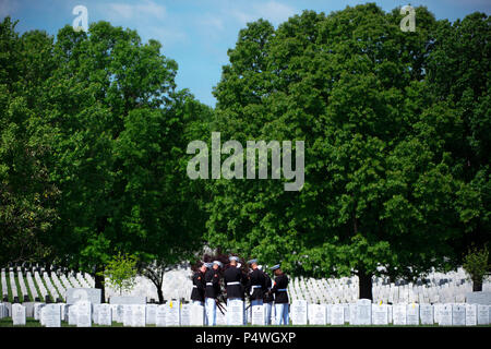 Marines prepare for the graveside service for Marine Corps Reserve 1st Lt. William Ryan, in Arlington National Cemetery, Arlington, Va, May 10, 2017.  Declared deceased as of May 11, 1969, Ryan’s remains from the Vietnam War were missing until identified by Defense POW/MIA Accounting Agency (DPAA) in 2016 from an excavated crash site near Ban Alang Noi, Laos. Ryan’s remains were repatriated in Section 60. Stock Photo