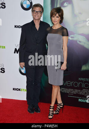 Harry Hamlin and Lisa Rinna  arriving at the Veronica Mars Premiere at the Chinese Theatre in Los Angeles.Harry Hamlin and Lisa Rinna  ------------- Red Carpet Event, Vertical, USA, Film Industry, Celebrities,  Photography, Bestof, Arts Culture and Entertainment, Topix Celebrities fashion /  Vertical, Best of, Event in Hollywood Life - California,  Red Carpet and backstage, USA, Film Industry, Celebrities,  movie celebrities, TV celebrities, Music celebrities, Photography, Bestof, Arts Culture and Entertainment,  Topix, vertical,  family from from the year , 2014, inquiry tsuni@Gamma-USA.com H Stock Photo