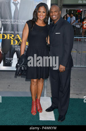 Laila Ali, Curtis Conway  at the Draft Day Premiere at the Westwood Village Theatre in Los Angeles.Laila Ali, Curtis Conway 132 ------------- Red Carpet Event, Vertical, USA, Film Industry, Celebrities,  Photography, Bestof, Arts Culture and Entertainment, Topix Celebrities fashion /  Vertical, Best of, Event in Hollywood Life - California,  Red Carpet and backstage, USA, Film Industry, Celebrities,  movie celebrities, TV celebrities, Music celebrities, Photography, Bestof, Arts Culture and Entertainment,  Topix, vertical,  family from from the year , 2014, inquiry tsuni@Gamma-USA.com Husband  Stock Photo