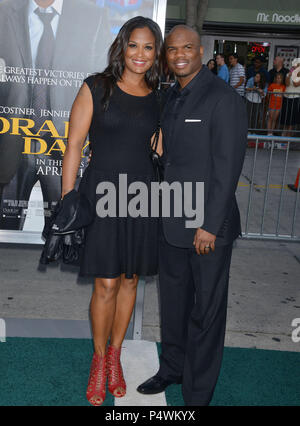 Laila Ali, Curtis Conway  at the Draft Day Premiere at the Westwood Village Theatre in Los Angeles.Laila Ali, Curtis Conway 133 ------------- Red Carpet Event, Vertical, USA, Film Industry, Celebrities,  Photography, Bestof, Arts Culture and Entertainment, Topix Celebrities fashion /  Vertical, Best of, Event in Hollywood Life - California,  Red Carpet and backstage, USA, Film Industry, Celebrities,  movie celebrities, TV celebrities, Music celebrities, Photography, Bestof, Arts Culture and Entertainment,  Topix, vertical,  family from from the year , 2014, inquiry tsuni@Gamma-USA.com Husband  Stock Photo