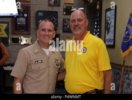 Fla. (May 9, 2017) Master Chief Petty Officer of the Navy Steven Giordano poses with a retired member of the Chiefs Mess during a visit to Naval Air Station Pensacola Corry Station. Stock Photo