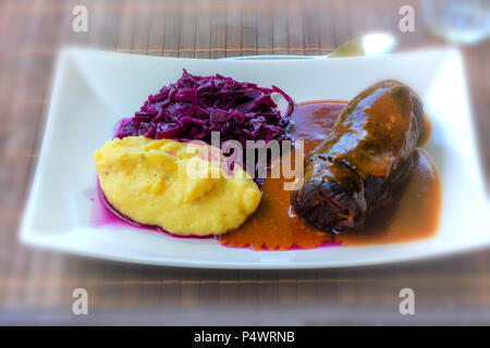 Beef roulade with red cabbage and mashed potatoes Stock Photo