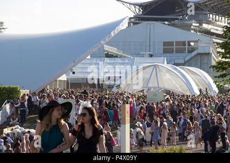 Large crowd of people walking through Royal Ascot on a sunny day Stock Photo