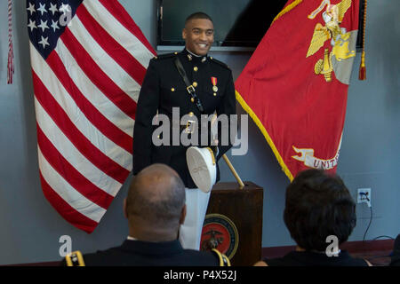 Second lieutenant Mitchell Harrison gave remarks during his Commissioning Ceremony at Embry-Riddle Aeronautical University’s College of Business in Daytona Beach, Florida, May 10, 2017. The ceremony commemorated Harrisons’ commission as a second lieutenant in the Marine Corps. Harrison completed the 10-week long Officer Candidates School and is preparing to leave for The Basic School in July 2017. Stock Photo