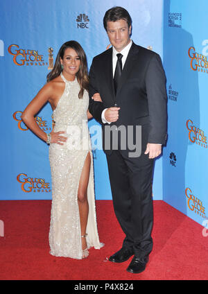 Lea Michele and Nathan Fillion in the press room of the 70th Golden