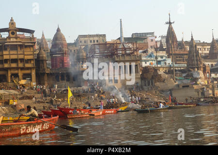 the burning ghats on the shore of river Ganges, Varanasi, India Stock Photo