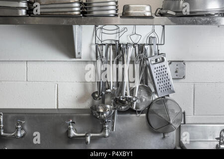 Restaurant Commercial Kitchen Stainless Steel Cooking Utensils Stock Photo