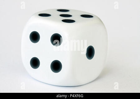 One dice on white background - close up macro stock photography Stock Photo