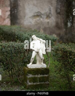 Herculaneum. House of the Deer. Statue marble discovered in the garden. Drunken Hercules. Replica. Campania, Italy. Roman period. Stock Photo