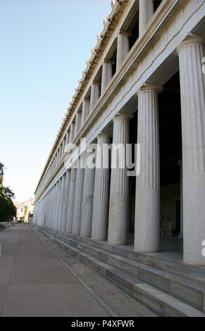 Greek Art. The Stoa of Attalos (Atallus). It was built by and named after King Attalos II of Pergamon who ruled between 159 BC and 138 BC. In the years 1953-1956 the Stoa was reconstructed. Ancient Agora from Athens. Central Greece. Attica. Europe. Stock Photo