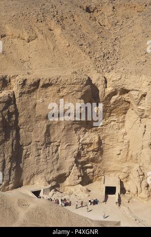 Egypt. Valley of the Kings. Tourists in a tomb entrance. New Kingdom. Stock Photo