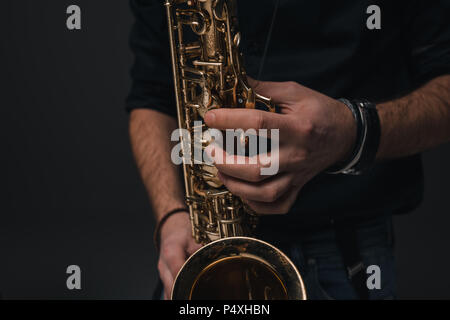cropped shot of jazz musician playing saxophone Stock Photo