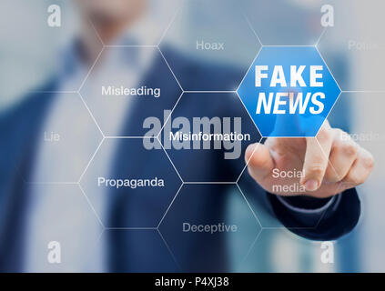 Fake News concept with a person showing misleading, deceptive stories, propaganda, lies, fabricated facts to control or manipulate opinion on internet Stock Photo