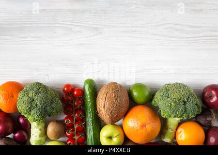 Composition with different fresh organic fruits and vegetables. Copy space. Top view. Flat lay. Stock Photo