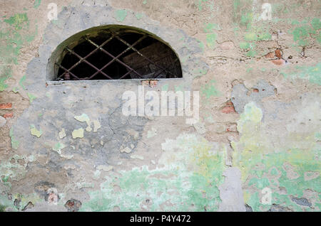 Cracked concrete vintage wall background, old wall texture. Stone texture in green and yellow colors. Concrete texture background. Turquoise grunge wa Stock Photo