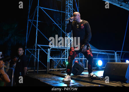 Naples, Italy. 23rd June, 2018. Gue Pequeno an Italian rapper and songwriter, performs live in concert at Arenile Reload in Napoli during his tour Gentleman tour 2018 summer edition. Credit: Paola Visone/Pacific Press/Alamy Live News Stock Photo