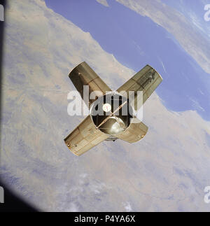 The expended Saturn IVB stage as photographed from the Apollo 7 spacecraft during transposition and docking maneuvers. This photograph was taken over Sonora, Mexico, during Apollo 7's second Stock Photo