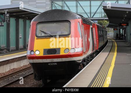 Edinburgh, UK. 23rd March 2018.  A Virgin Trains East Coast Service thunders through Edinburgh Gateway station bound for Aberdeen. This HST 43206 is one of the last services to run on the East Coast mainline before the franchise is taken over officially by LNER on 23rd June 2018. Due to operational difficulties the government has taken back control of this rail franchise which was operated by Stagecoach and Virgin. © Garry Cornes / Alamy Live News Stock Photo