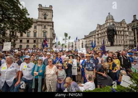 London, UK. 23rd June, 2018. Crowd at Parliament Square watching speakers at the end of the Anti-Brexit march. Whitehall in background. Credit: Graeme Weston/Alamy Live News Stock Photo