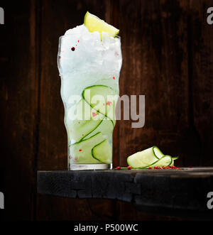 Gin Tonic with gin, tonic, cucumber, lime and red pepper Stock Photo