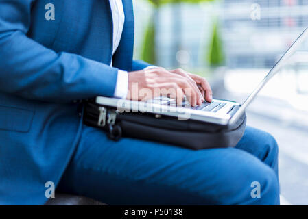 Businessman using laptop Stock Photo