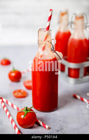 Homemade tomato juice in swing top bottle Stock Photo