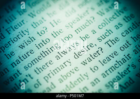 Words in a book printed in black close-up. Words always and sometimes in the field. Background, blue filter Stock Photo