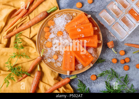 Carrot ice lollies Stock Photo