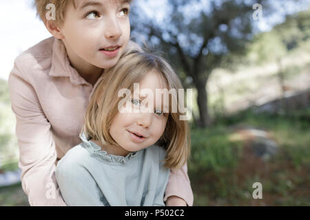 Portrait of brother and little sister Stock Photo