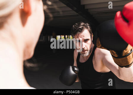 Man and woman in boxing training Stock Photo