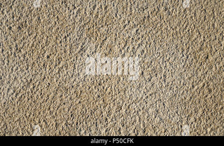 Wall from plaster, background in brown and grey tones, relief picture, stone texture. Big dimension for advertising Stock Photo
