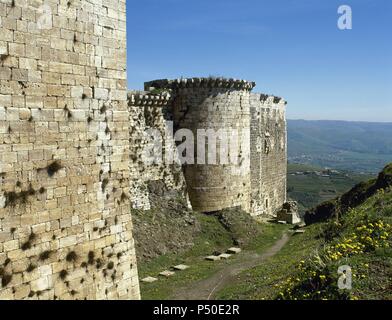 Syria. Krak des Chevaliers. Castle built in the twelfth century by the Knights Hospitaller during the Crusades to the Holy Land. Stock Photo
