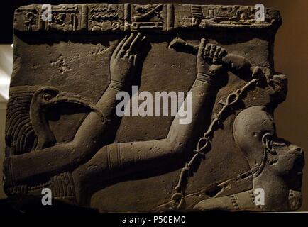 Egyptian Art. Cornice Block with relief showing the Baptism of Pharaoh Roman Period. 41- 68 A.D. Sandstone.  1st Cataract, Philae, Temple of Harendotes. Egypt. Metropolitan Museum of Art. New York. United States. Stock Photo