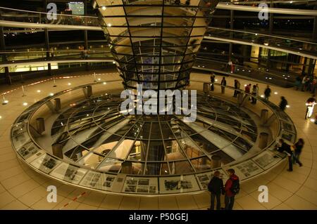 Dome of the Reichstag, seat of the German Parliament, designed by Norman Foster (b.1935). Interior. Night. Berlin. Germany. Stock Photo