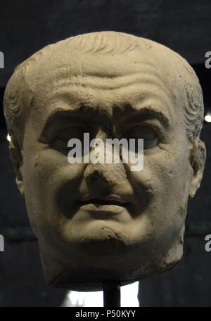 Vespasian (9-79). Roman Emperor. Founder of the Flavian dynasty. Colossal Head. Marble. From National Archaeological Museum (Naples). Temporary exhibition, Vespasian. The two-thousandth anniversary of the Flavian Dynasty. Roman Forum. Rome. Italy. Stock Photo