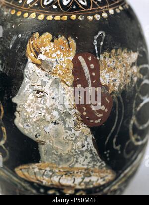 Art Greek. Magna Graecia. Greek vase painting. Red figure pottery. Lekythus. Used for storing oil. Decorated with a female face. Egnatia, Italy. Museum of Perfume. Barcelona.  Spain. Stock Photo