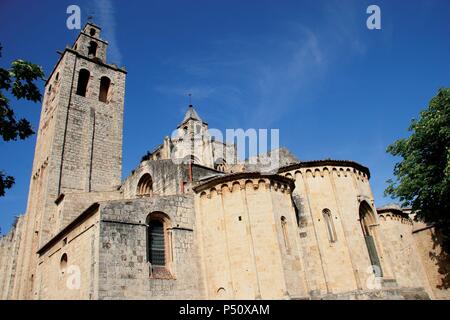 Art romanesque. The Royal Benedictine Monastery of Sant Cugat. Built betwenn the 9th and 14th centuries. View of the bell tower and the apsis. Sant Cugat del Valles.  Catalonia. Spain. Stock Photo